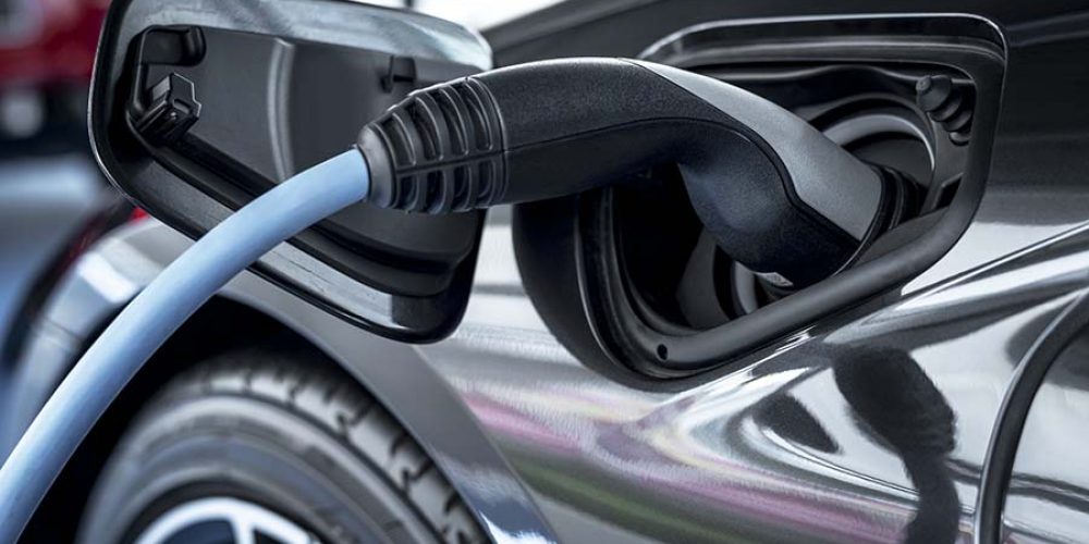 Electric car at charging station
